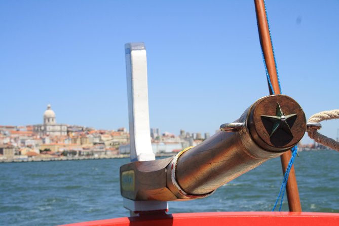 2-Hour Lisbon Traditional Boats Sunset Cruise with White Wine - From Commerce Square beneath the 25 de Abril Bridge