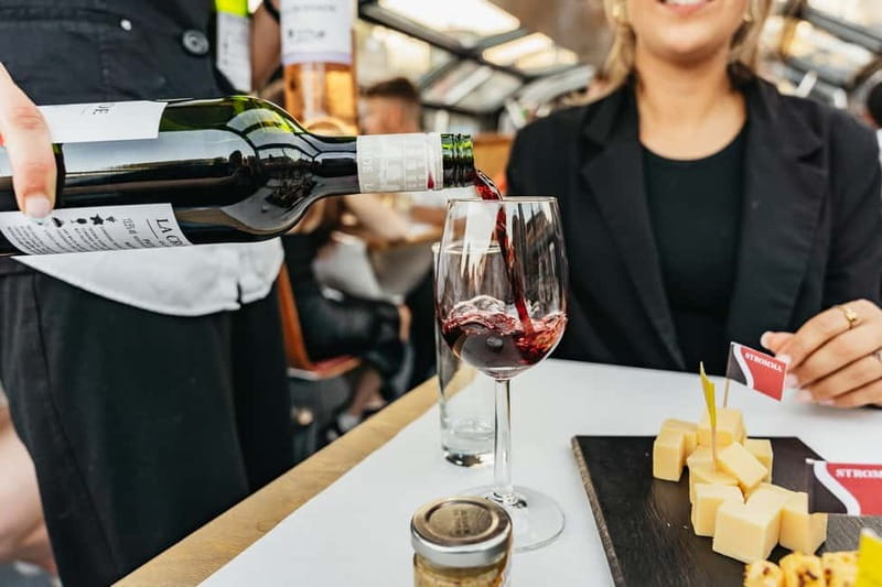 Amsterdam: Cozy Cheese & Wine Cruise Tasting Experience - Settling into the heated boat