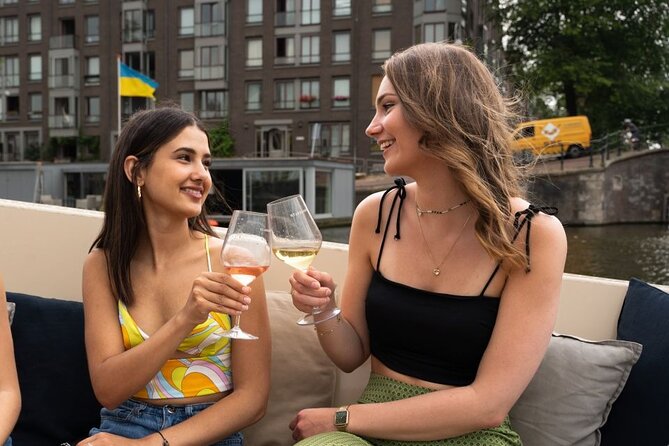 Amsterdam: Evening Candle Light Cruise With Wine & Cheese - Magere Brug and the Amstel Connection