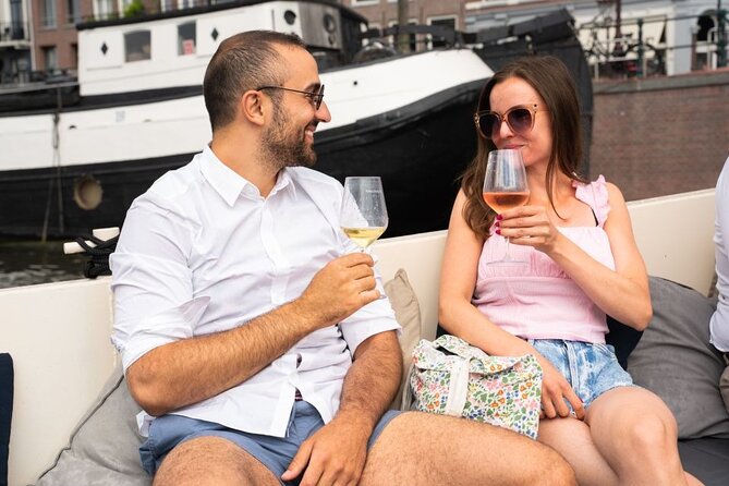 Amsterdam: Evening Candle Light Cruise With Wine & Cheese - Seven Bridges, Rokin, and the Return Route