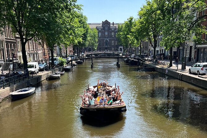 Amsterdam Luxury Boutique Boat tour with Unlimited Beer and Wine - A short cruise with a clear purpose