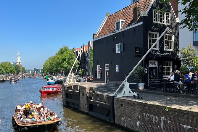 Amsterdam Luxury Boutique Boat tour with Unlimited Beer and Wine - Magere Brug and the final canal views