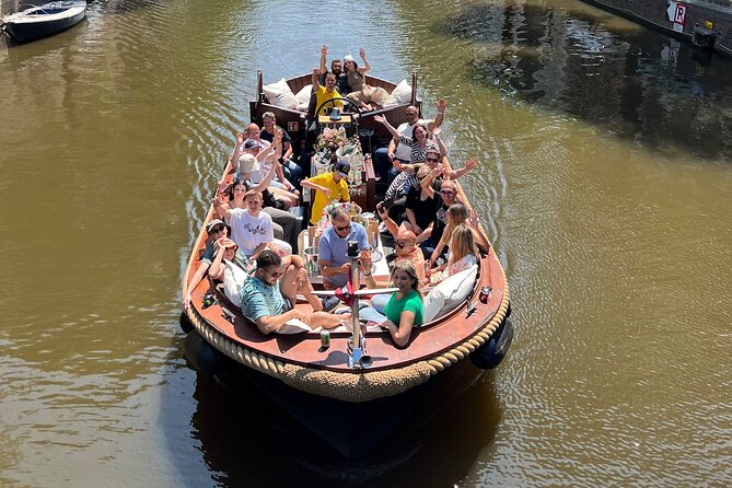 Amsterdam Luxury Boutique Boat tour with Unlimited Beer and Wine - Meeting point and boat identification