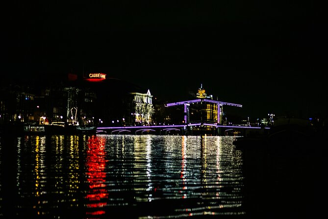 Amsterdam Small-Group Evening Canal Cruise Including Wine, Craft Beer, Cheese - Historic sights from the water