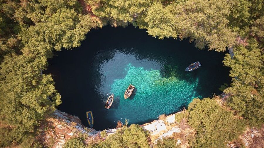 Argostoli: Melissani & Drogarati Cave Tour with Wine Tasting - Melissani Cave and the traditional wooden boat