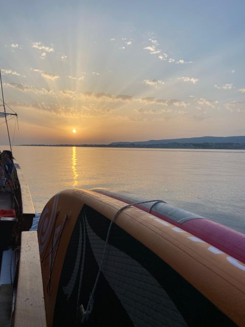 Argostoli: Sunset Cruise with Swim Stops, Dinner, and Wine - Swimming, snorkeling, paddle boards, and the dinghy
