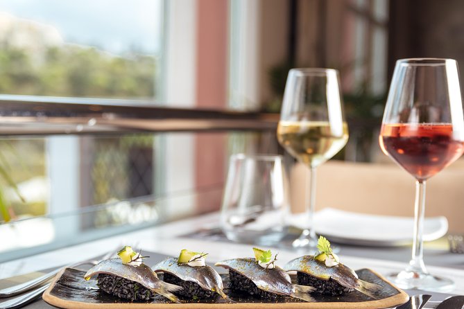 Athens: Greek Wines Tasting with Sommelier and Acropolis Views - Six to eight Greek wines, with unfamiliar names and distinct styles