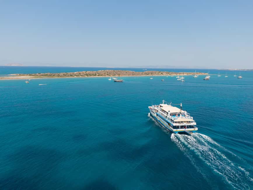 Athens: Swimming Cruise with Lunch, Wine & Live DJ on Board - Metopi: a 40-minute swim from the boat