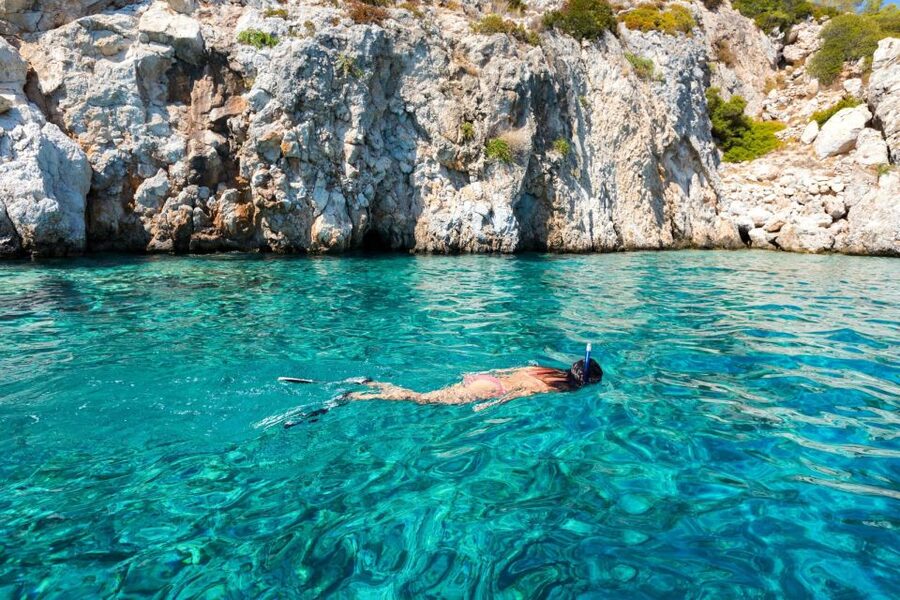 Athens: Swimming Cruise with Lunch, Wine & Live DJ on Board - Aegina: island time, views, and pistachio treats