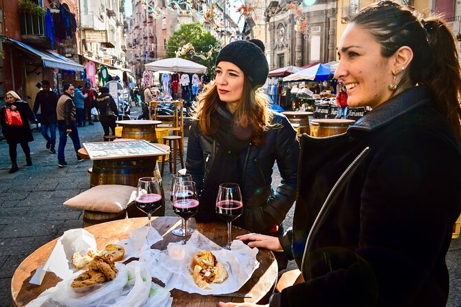 Authentic Naples Food Tour with 8+ Tastings of Pizza, Wine & More - A square in the Decumani and the local meal