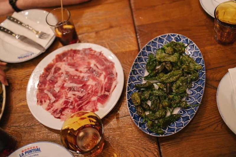 Barcelona: Food Walking Tour with Tapas and Wine - The practical value of four arranged stops