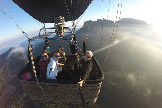 Barcelona: Montserrat Hot Air Balloon Ride with Champagne Toast - Watching the balloon take shape