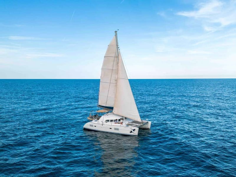 Barcelona: Sunset Catamaran Cruise with Wine and Tapa - What to Bring for a Comfortable Evening