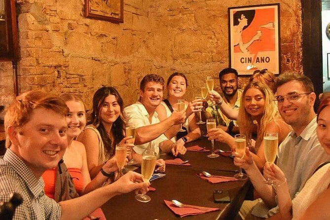 Barcelona Tapas Walking Tour: Food, Wine & History - Walking through the Gothic Quarter between bites