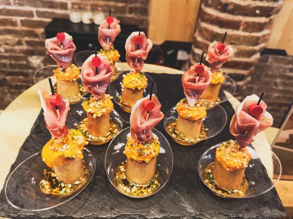 Barcelona Tapas & Wine Private Tour in Traditional Taverns - Stop four: Catalan cava in a 1912 bar