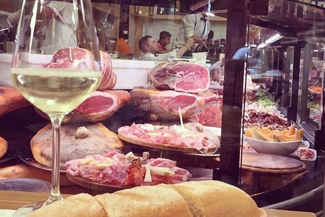 Bologna Food & Wine tour with a local Chef - Piazza Maggiore sets the scene at 1:30 pm