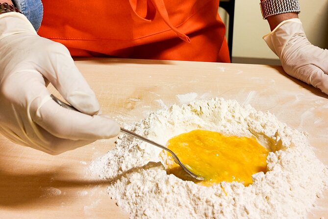 Bologna Local Pasta Cooking Class, Ragu, Spritz, Wine & Gelato - Sitting down to eat your own pasta