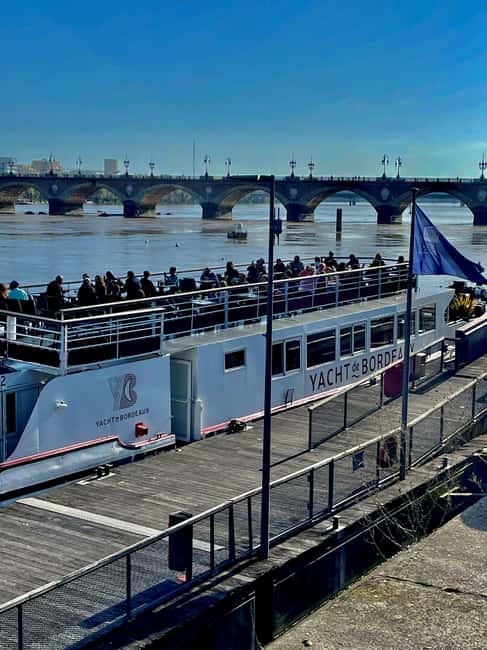 Bordeaux: River Garonne Cruise with Glass of Wine and Canelé - The First Views: Pont de Pierre and Place de la Bourse