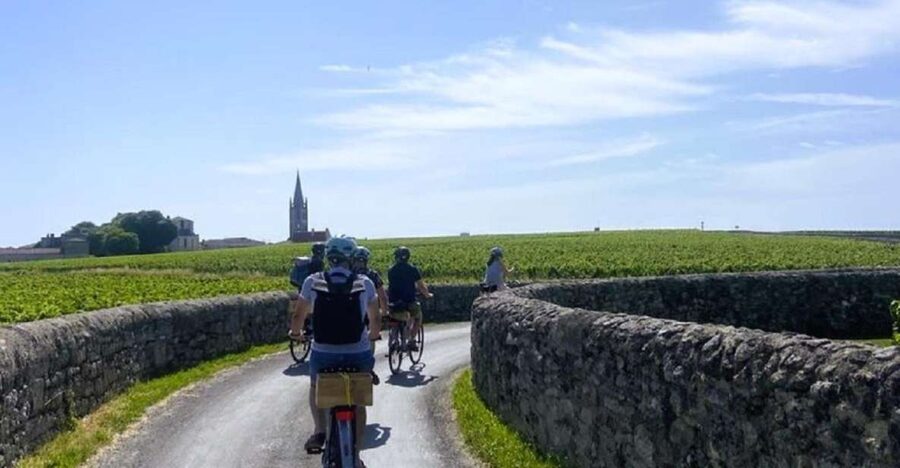 Bordeaux: St-Emilion Vineyards e-Bike Tour with Wine & Lunch - Pedaling past Cheval Blanc and Petrus