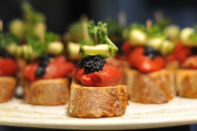 Born to Eat: Gourmet Tapas & Wine Small Group Tour in Old Barcelona - Mercat del Born and the city beneath the market