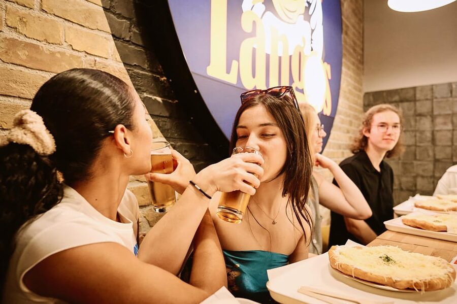 Budapest: Guided Food Tour with Wine, Beer, and Shots - The walk through District 7 and Andrassy Avenue
