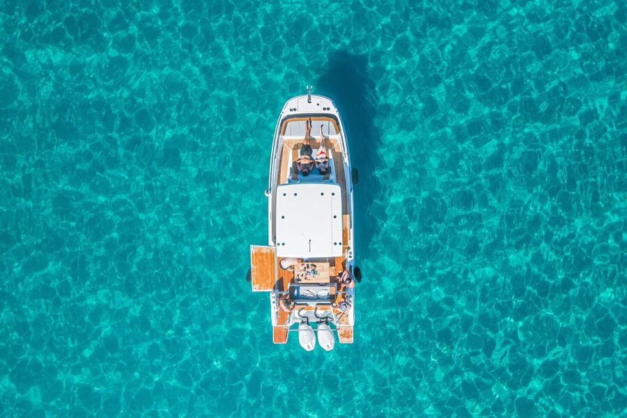 Cagliari: Luxury Motorboat Tour with 3 Swim Stops & Wine - Boat comfort, group size, and the guide