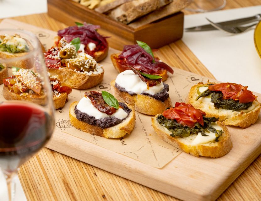 Catania: Volcanic Wine Tasting in a Metropolitan Market - Four wines, four food pairings