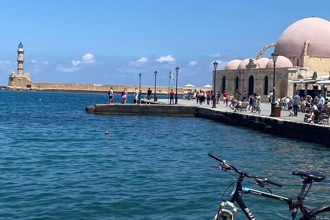 Chania Walking Food And Wine Night Tour - Cheese, wine, and sunset at the harbor