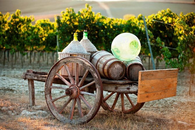 Chianti Delights: A Tale Of Two Wineries With A Vineyard Dinner - Outdoor sunset or indoor farmhouse dinner