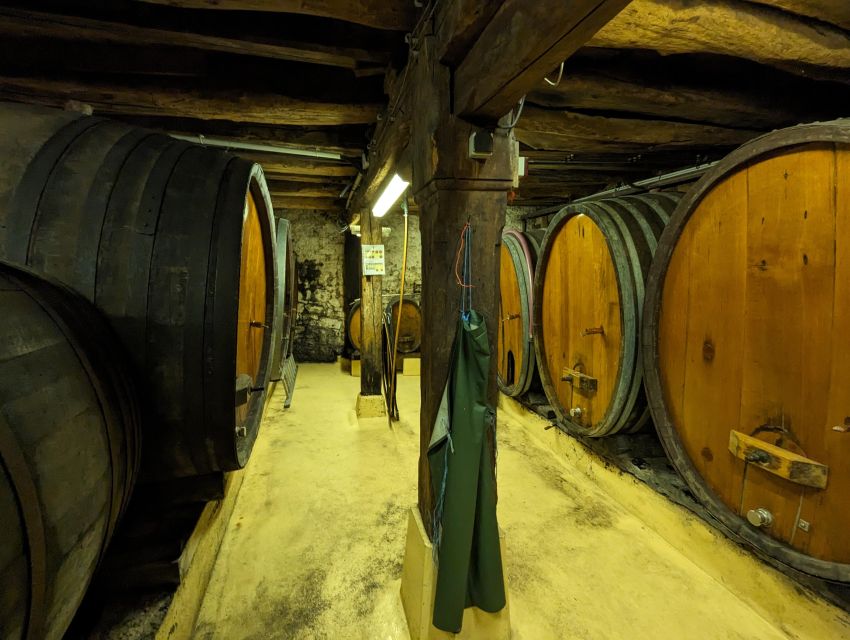 Colmar: Highlights Walking Tour and Wine Tasting - Stories behind the French and German influence
