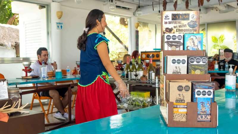 Cozumel: Seaside Chocolate Workshop and Wine Tasting - Grinding cocoa and making your own bar
