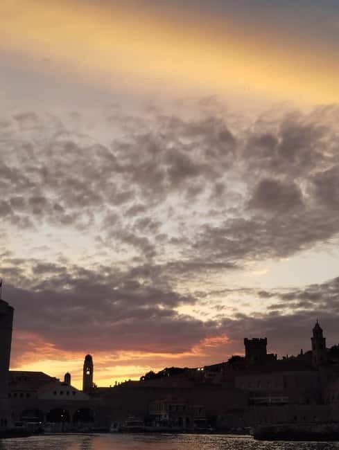 Dubrovnik: Sunset Catamaran Cruise with Sparkling Wine - Who should book this Dubrovnik boat ride?