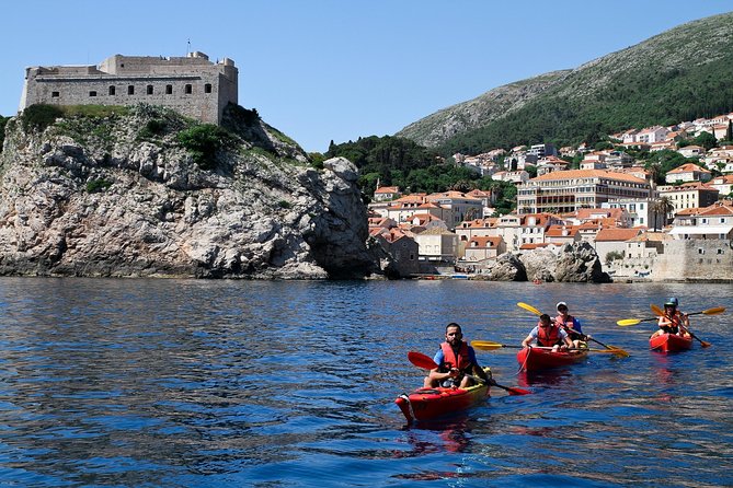 Dubrovnik: Sunset Kayaking & Snorkeling with water &wine - Paddling beneath the Old Town walls