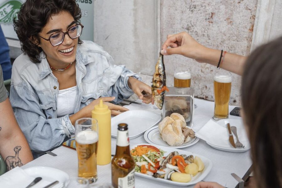 Eat & Walk Through Lisbon: A Local Food & Wine Experience - Starting beneath the Portuguese flag
