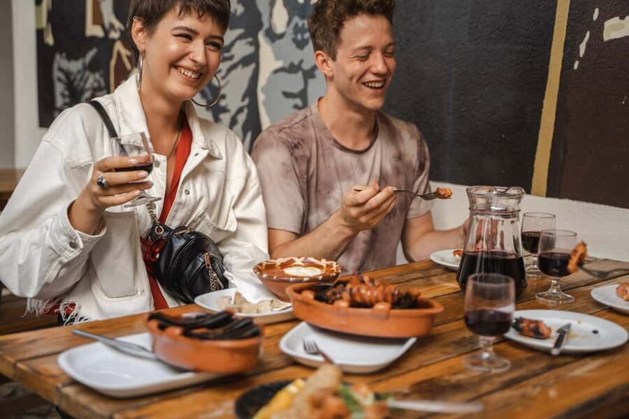 Eat & Walk Through Lisbon: A Local Food & Wine Experience - Baixa explains the new Lisbon
