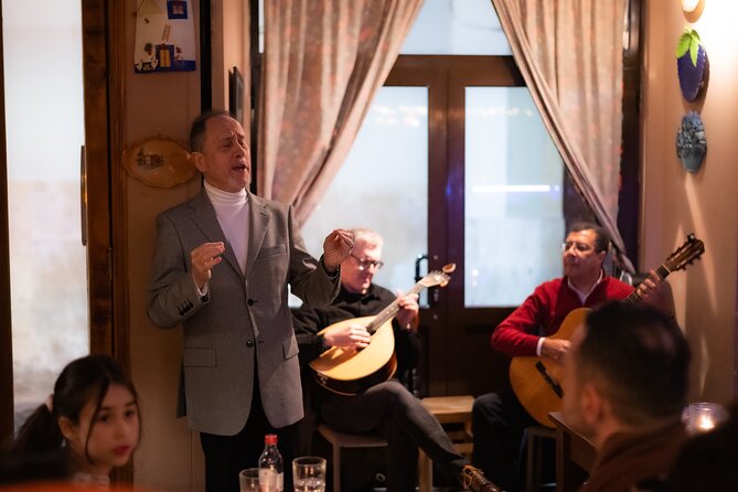 Fado Musical Experience with Portuguese Wine & Appetizers - What the guide adds to the evening