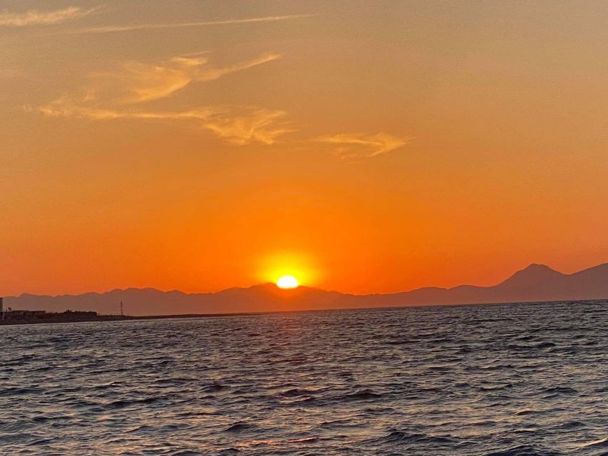 Faliraki: Evening RIB Cruise with Champagne and Sunset Views - Rhodes Town from offshore
