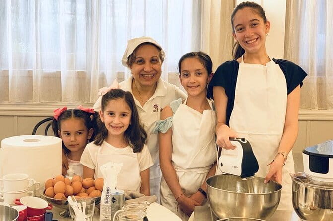 Florence: Cooking Class Pasta & Tiramisu Making Unlimited Wine - Rolling pasta from simple ingredients