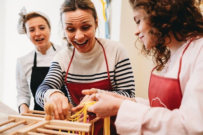 Florence: Pasta Cooking Class with Unlimited Wine - Tuscan wine and a lively classroom mood