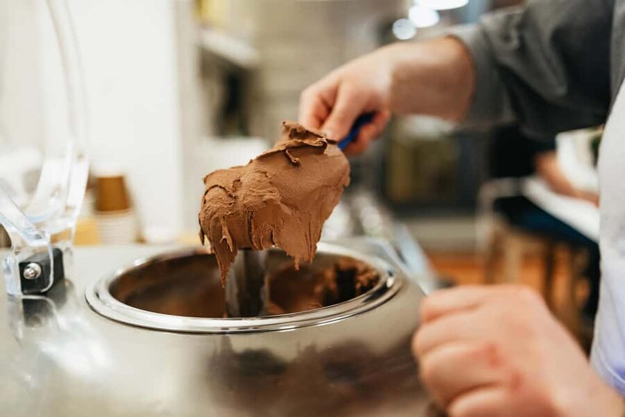 Florence: Premium Pizza & Gelato Preparation Class with Wine - Stretching pizza dough the Italian way