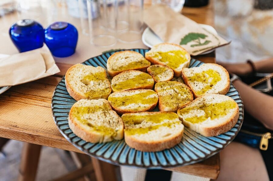From Chania: Wine and Olive Oil Tasting Tour with Snacks - The ancient olive tree in a traditional village