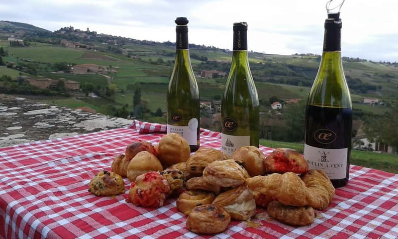 From Lyon: Golden Stones Beaujolais Wine Tasting Tour - The first tasting: wine with a view and a pastry