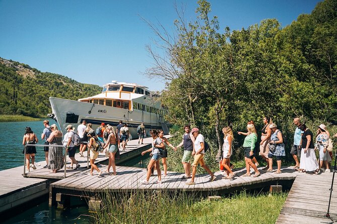 From Split: Krka Waterfalls, Food & Wine Tasting Tour - Krka National Park and the wooden boardwalks
