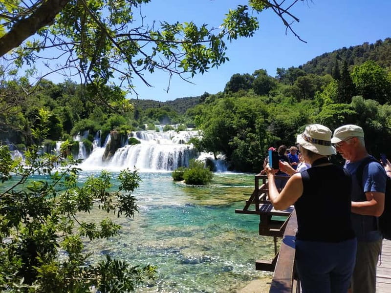 From Split: Krka Waterfalls with Wine & Cheese Tasting Tour - Entering Krka National Park
