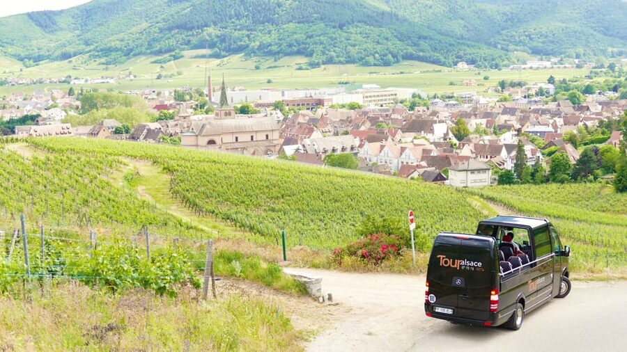From Strasbourg: Medieval Villages & Wine Tasting Day Trip - The coach, audio guide, and tour style