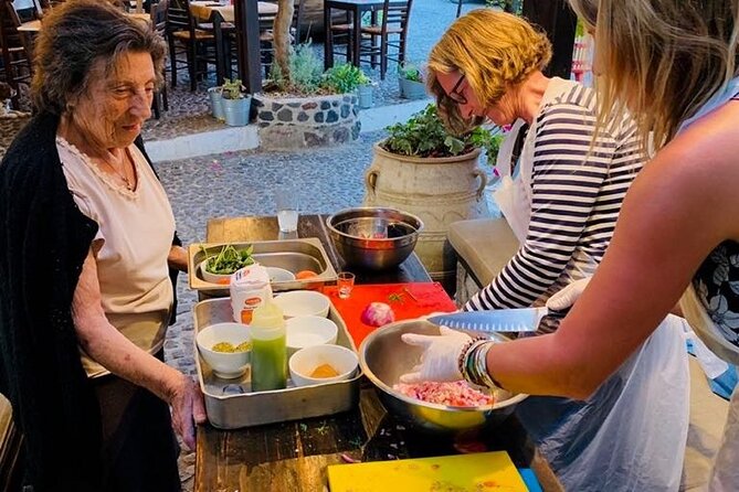 Greek Cuisine Cooking Class in Santorini with Recipes and Wine - Rolling up your sleeves with Chef Christos