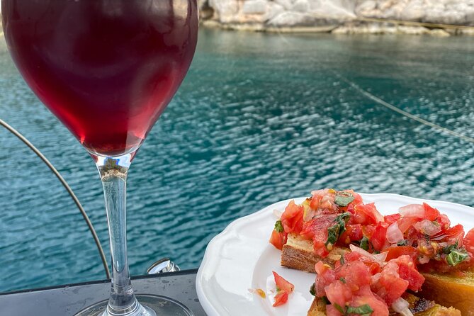 Greek Gastronomy & Wine Pairing Cruise with a Sommelier in Athens - Wine pairing, drinks, and the fine print