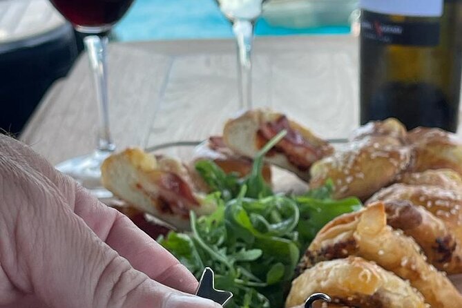 Greek Gastronomy & Wine Pairing Cruise with a Sommelier in Athens - Sunset, music, and the ride home