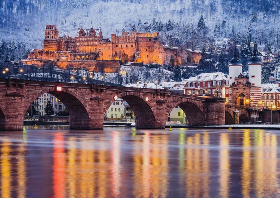 Heidelberg: Sightseeing Boat Tour with Mulled Wine - Snow-covered old town views on the return