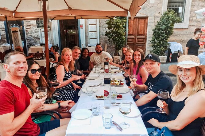 Jewish Ghetto & Piazza Navona: Food, Wine & Sightseeing Rome Tour - Portico di Ottavia and the first shared plates